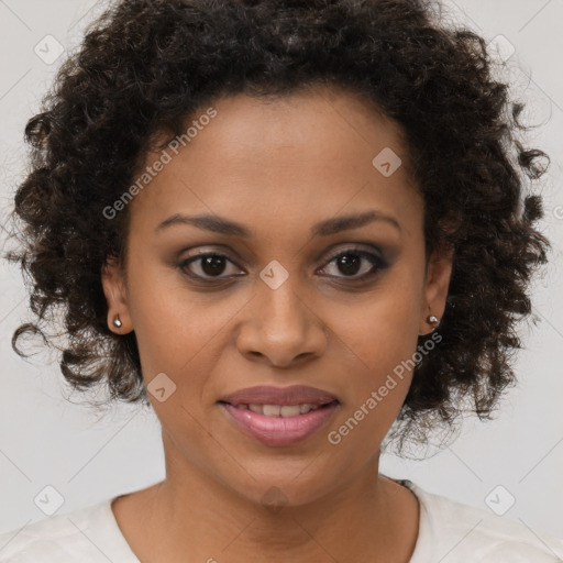 Joyful black young-adult female with medium  brown hair and brown eyes