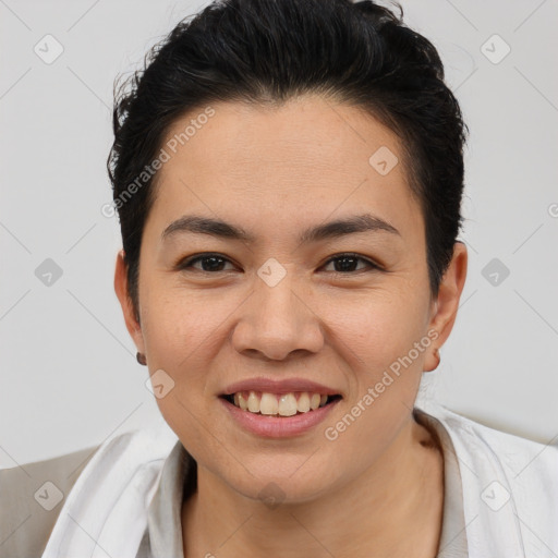 Joyful asian young-adult female with short  brown hair and brown eyes