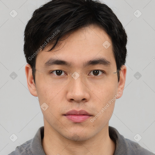 Neutral asian young-adult male with short  black hair and brown eyes