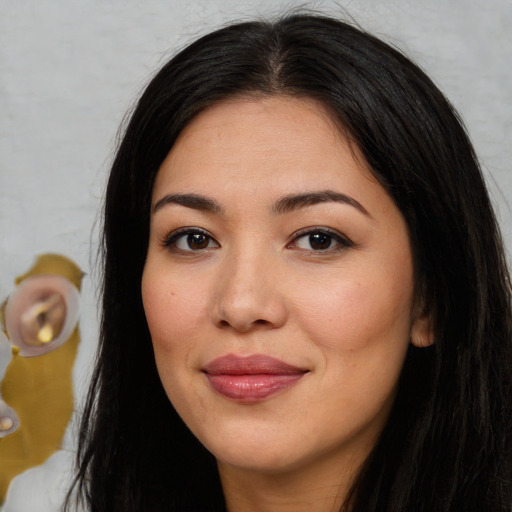 Joyful asian young-adult female with long  black hair and brown eyes