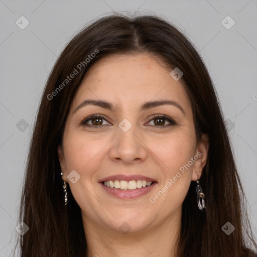 Joyful white young-adult female with long  brown hair and brown eyes