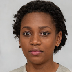 Neutral black young-adult female with short  brown hair and brown eyes