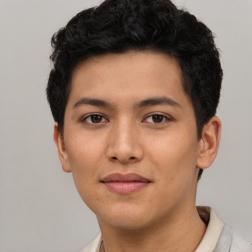 Joyful asian young-adult female with short  black hair and brown eyes