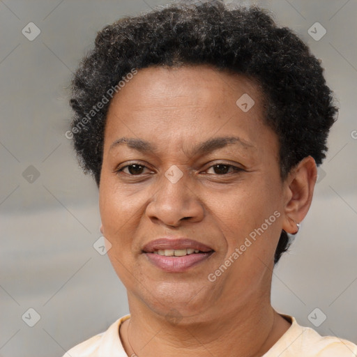 Joyful latino adult female with short  brown hair and brown eyes