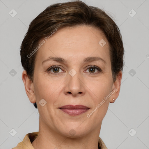 Joyful white adult female with short  brown hair and grey eyes