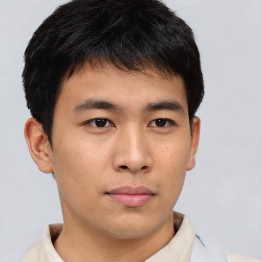 Neutral asian young-adult male with short  brown hair and brown eyes