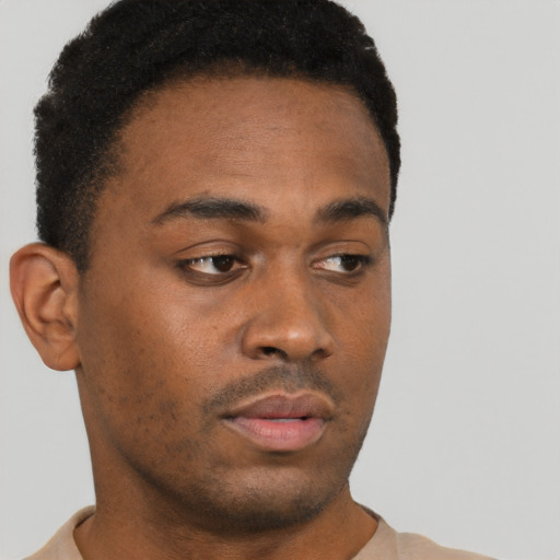 Neutral black young-adult male with short  brown hair and brown eyes