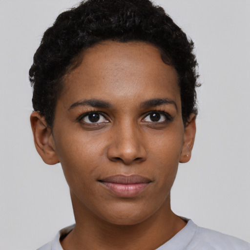 Neutral black young-adult female with short  brown hair and brown eyes