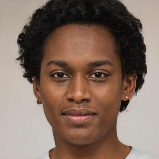 Neutral black young-adult female with short  black hair and brown eyes