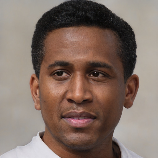 Neutral black young-adult male with short  black hair and brown eyes