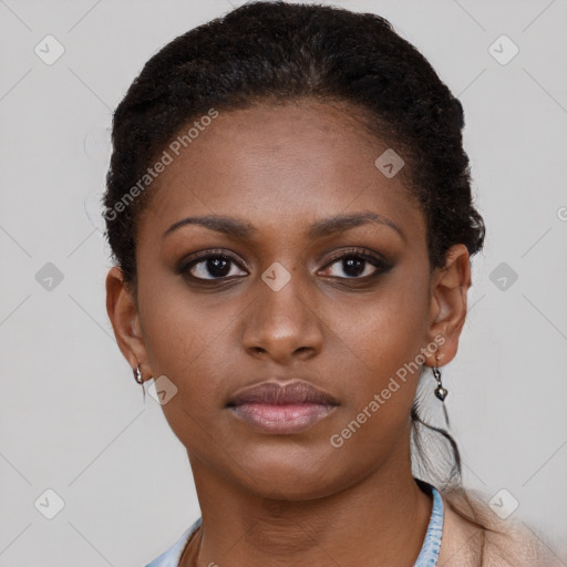 Neutral black young-adult female with short  brown hair and brown eyes