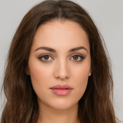 Neutral white young-adult female with long  brown hair and brown eyes