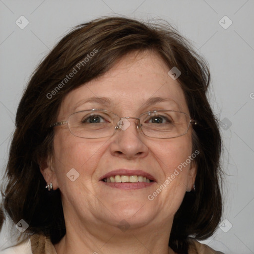 Joyful white adult female with medium  brown hair and blue eyes