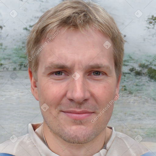 Joyful white adult male with short  brown hair and grey eyes