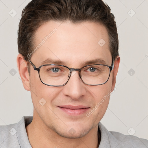 Joyful white adult male with short  brown hair and grey eyes