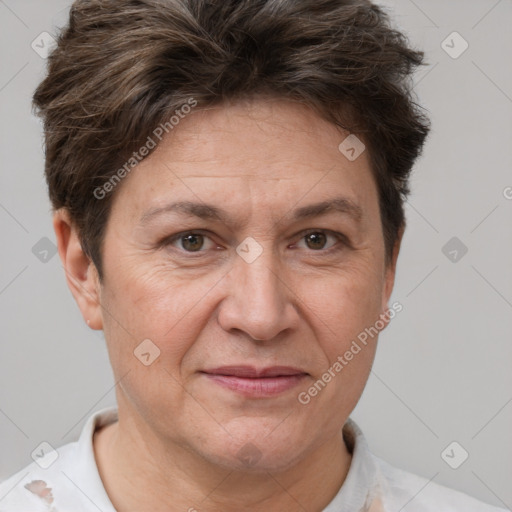 Joyful white adult female with short  brown hair and brown eyes