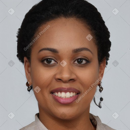 Joyful black young-adult female with short  brown hair and brown eyes