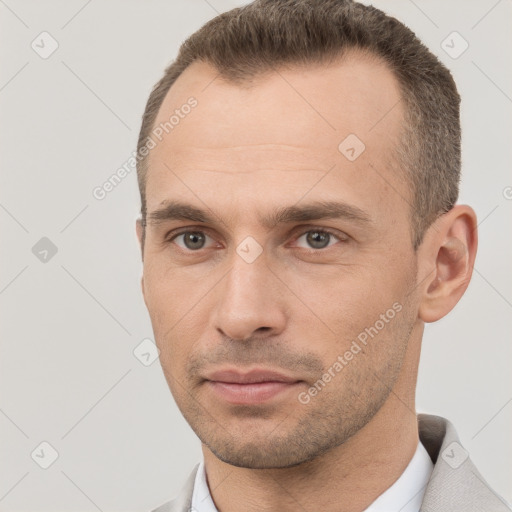 Neutral white young-adult male with short  brown hair and brown eyes