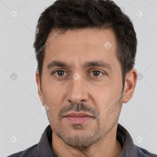 Neutral white adult male with short  brown hair and brown eyes