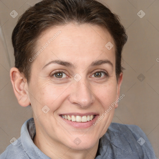 Joyful white adult female with medium  brown hair and grey eyes