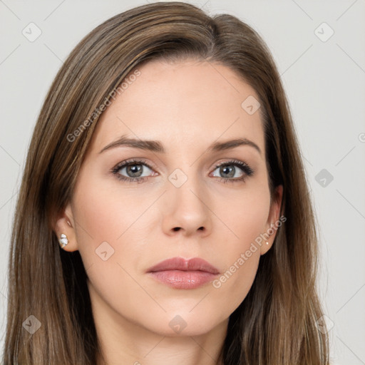 Neutral white young-adult female with long  brown hair and brown eyes