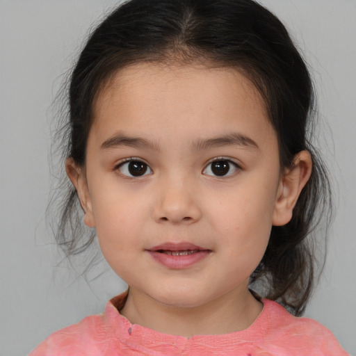 Joyful white child female with medium  brown hair and brown eyes