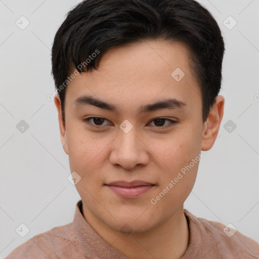 Joyful asian young-adult male with short  brown hair and brown eyes