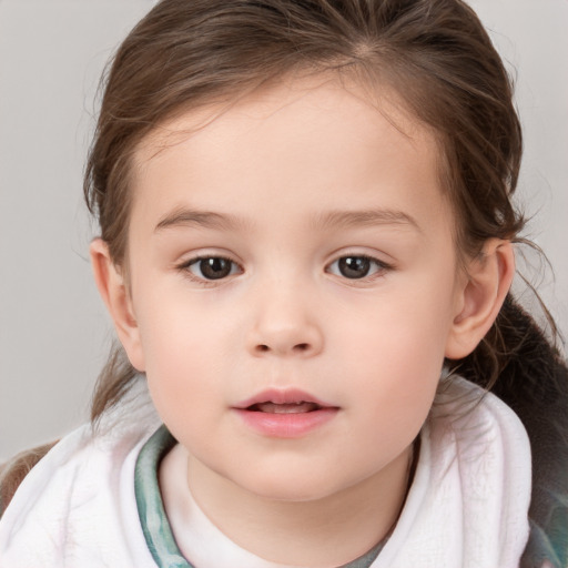 Neutral white child female with medium  brown hair and brown eyes