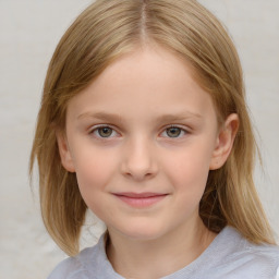 Joyful white child female with medium  brown hair and blue eyes