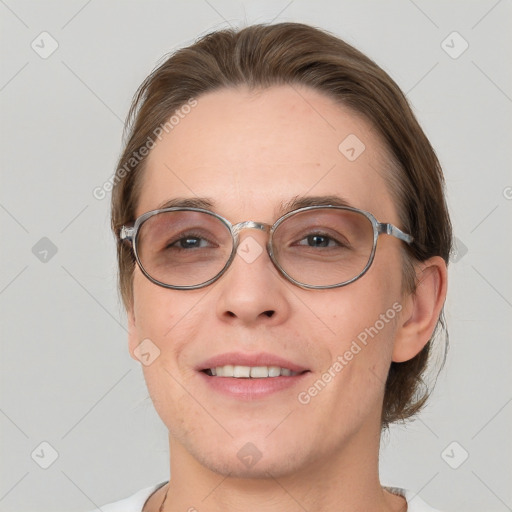 Joyful white young-adult female with short  brown hair and grey eyes