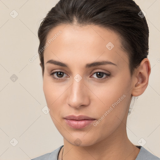 Neutral white young-adult female with medium  brown hair and brown eyes