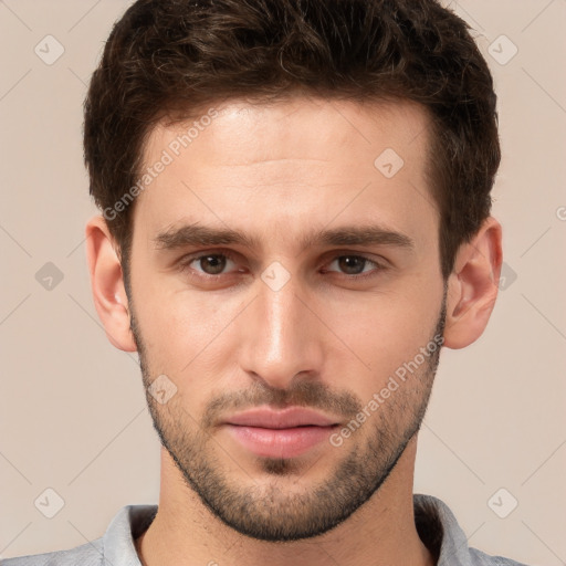 Joyful white young-adult male with short  brown hair and brown eyes