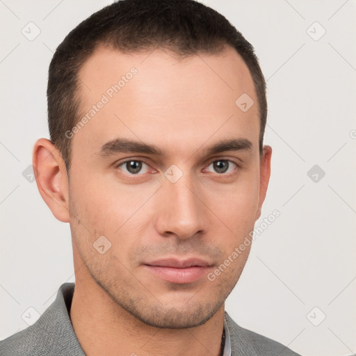 Neutral white young-adult male with short  brown hair and brown eyes