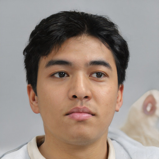 Neutral asian young-adult male with short  brown hair and brown eyes
