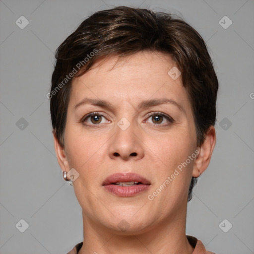 Joyful white adult female with short  brown hair and brown eyes