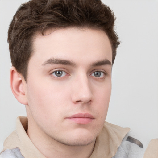 Neutral white young-adult male with short  brown hair and grey eyes