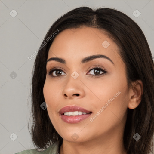 Joyful white young-adult female with long  black hair and brown eyes