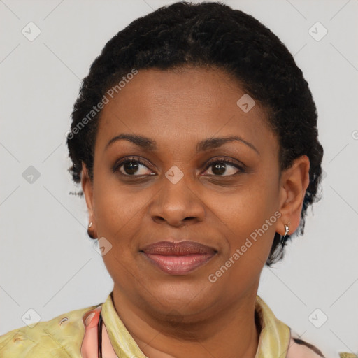 Joyful latino young-adult female with short  black hair and brown eyes