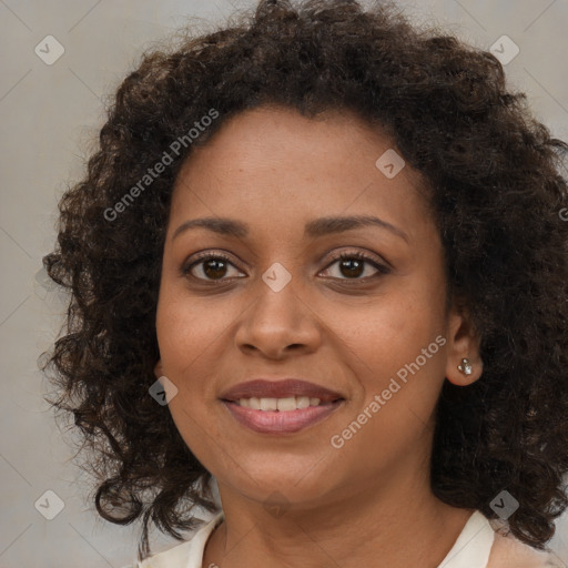 Joyful black young-adult female with medium  brown hair and brown eyes