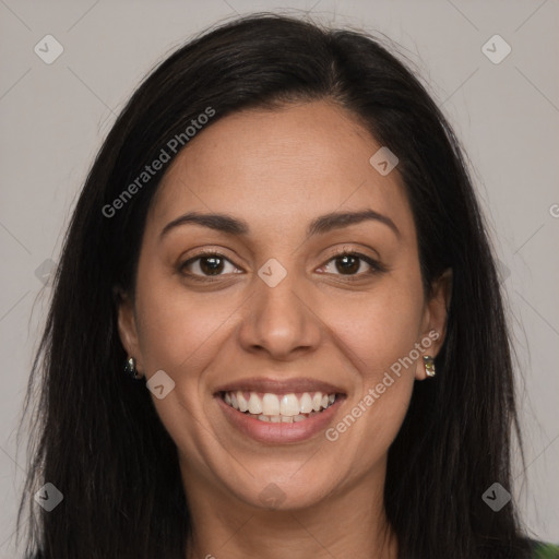 Joyful latino young-adult female with long  brown hair and brown eyes