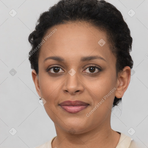 Joyful latino young-adult female with short  brown hair and brown eyes