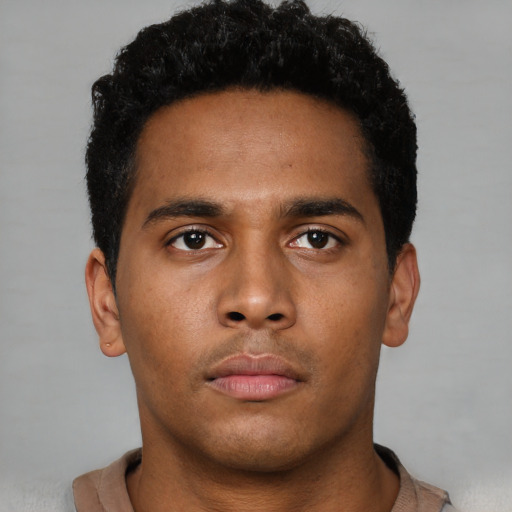 Neutral black young-adult male with short  brown hair and brown eyes