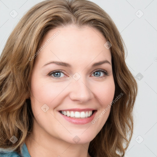 Joyful white young-adult female with long  brown hair and green eyes