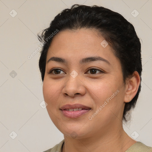 Joyful latino young-adult female with short  brown hair and brown eyes