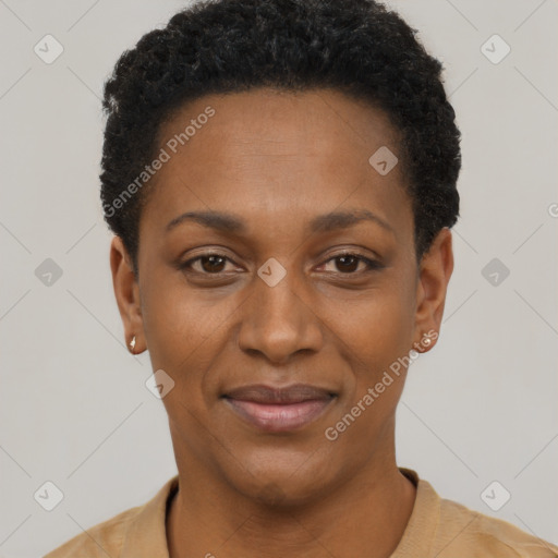 Joyful black young-adult female with short  black hair and brown eyes
