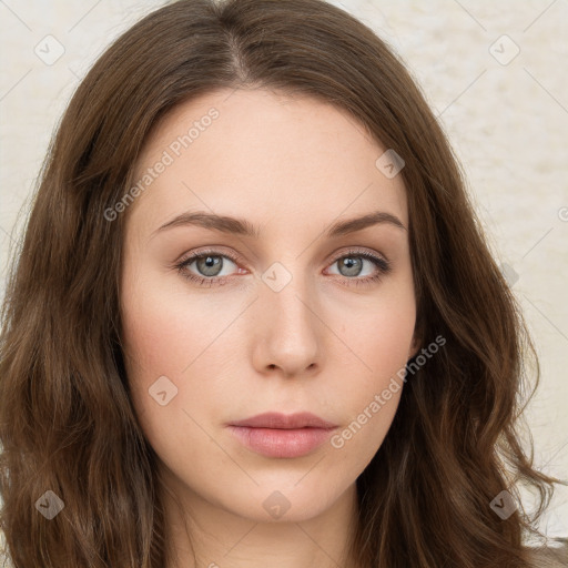 Neutral white young-adult female with long  brown hair and green eyes