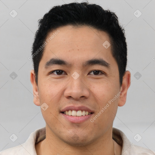 Joyful asian young-adult male with short  brown hair and brown eyes