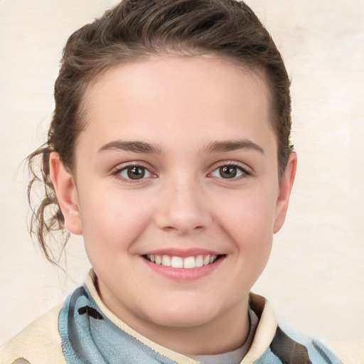 Joyful white child female with short  brown hair and brown eyes