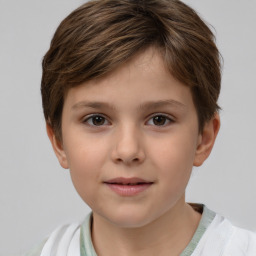 Joyful white child female with short  brown hair and brown eyes