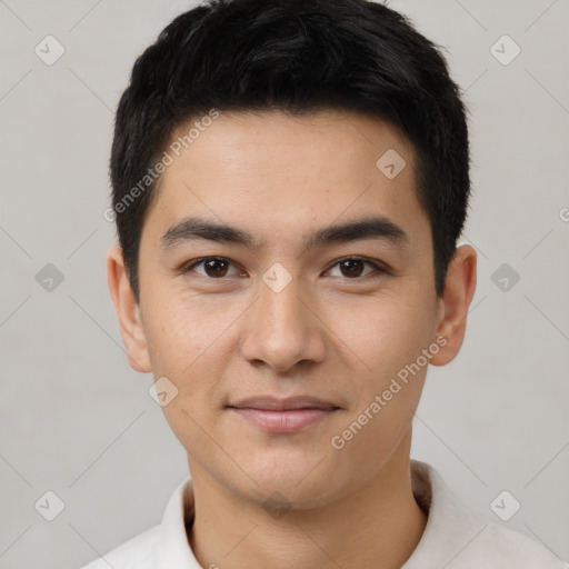 Joyful white young-adult male with short  black hair and brown eyes